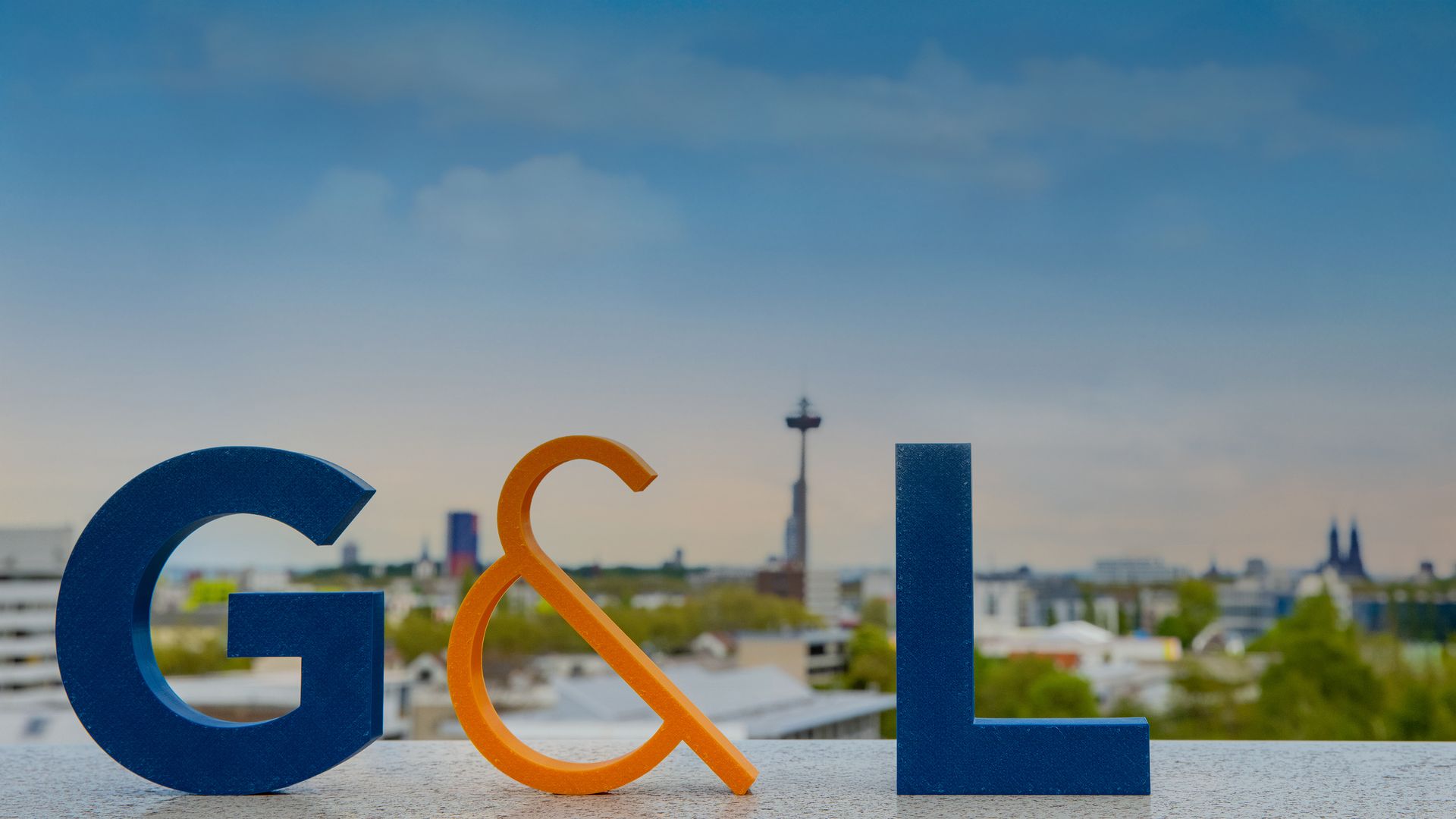 G&amp;L Systemhaus with cologne cityscape in background