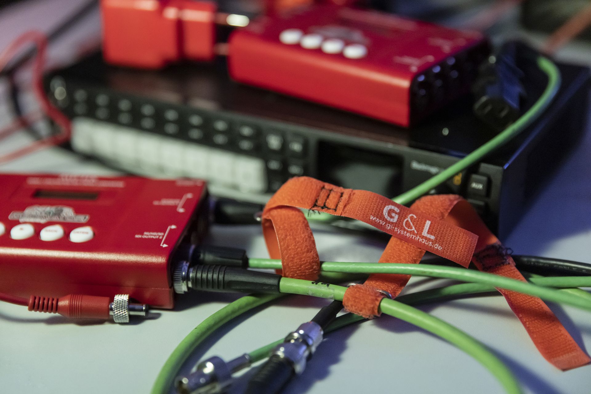 technical equipment with tangled cables and G&amp;L Logo