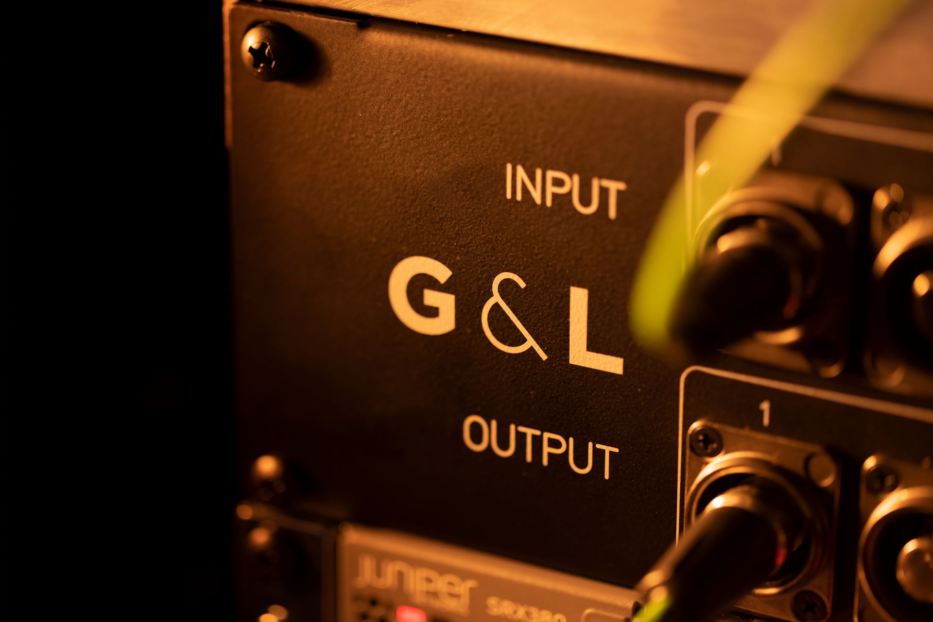 cable interface of G&amp;L equipment labeled with input and output