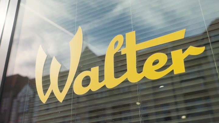 Picture of Window showing the branded Logo of Walter Confiserie in yellow