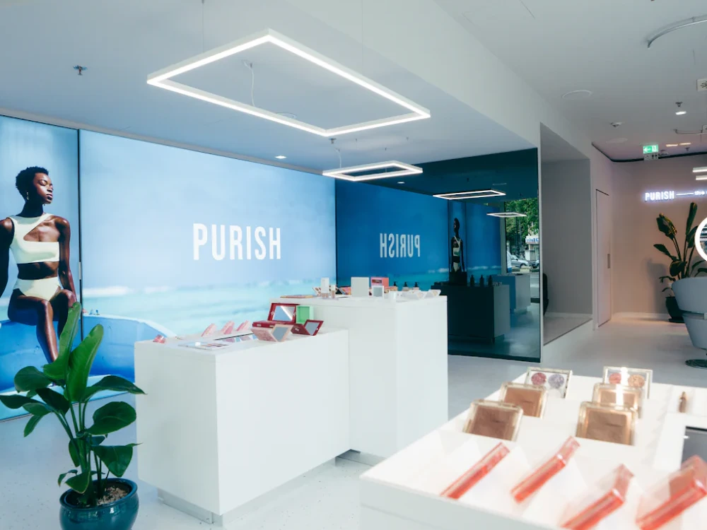 Modern Purish GmbH cosmetics showroom and retail display in Berlin showcasing trendy international beauty and skincare brands.