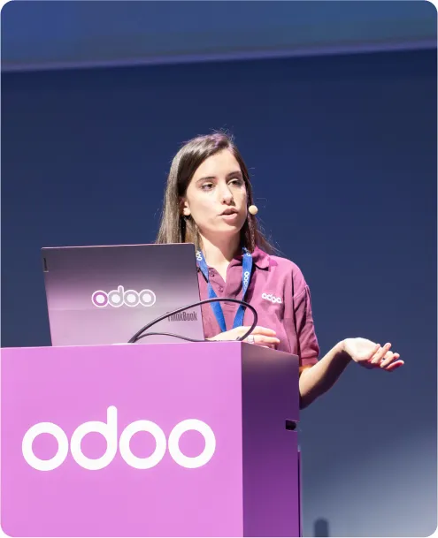 Employee giving a talk on stage
